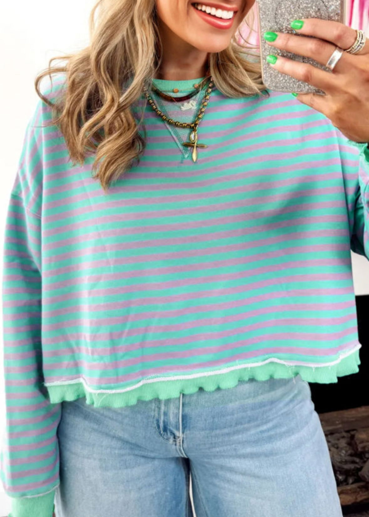 Exposed ruffle hem top