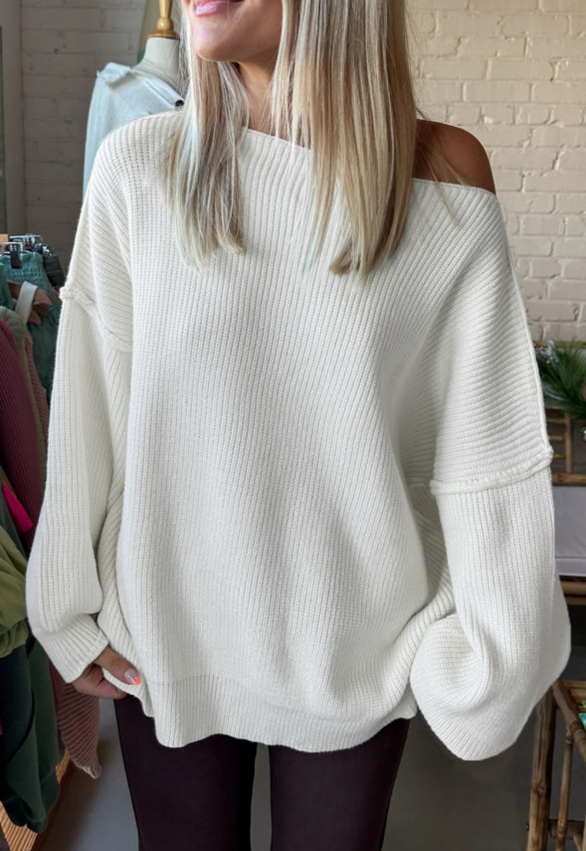 White asymmetric sweater